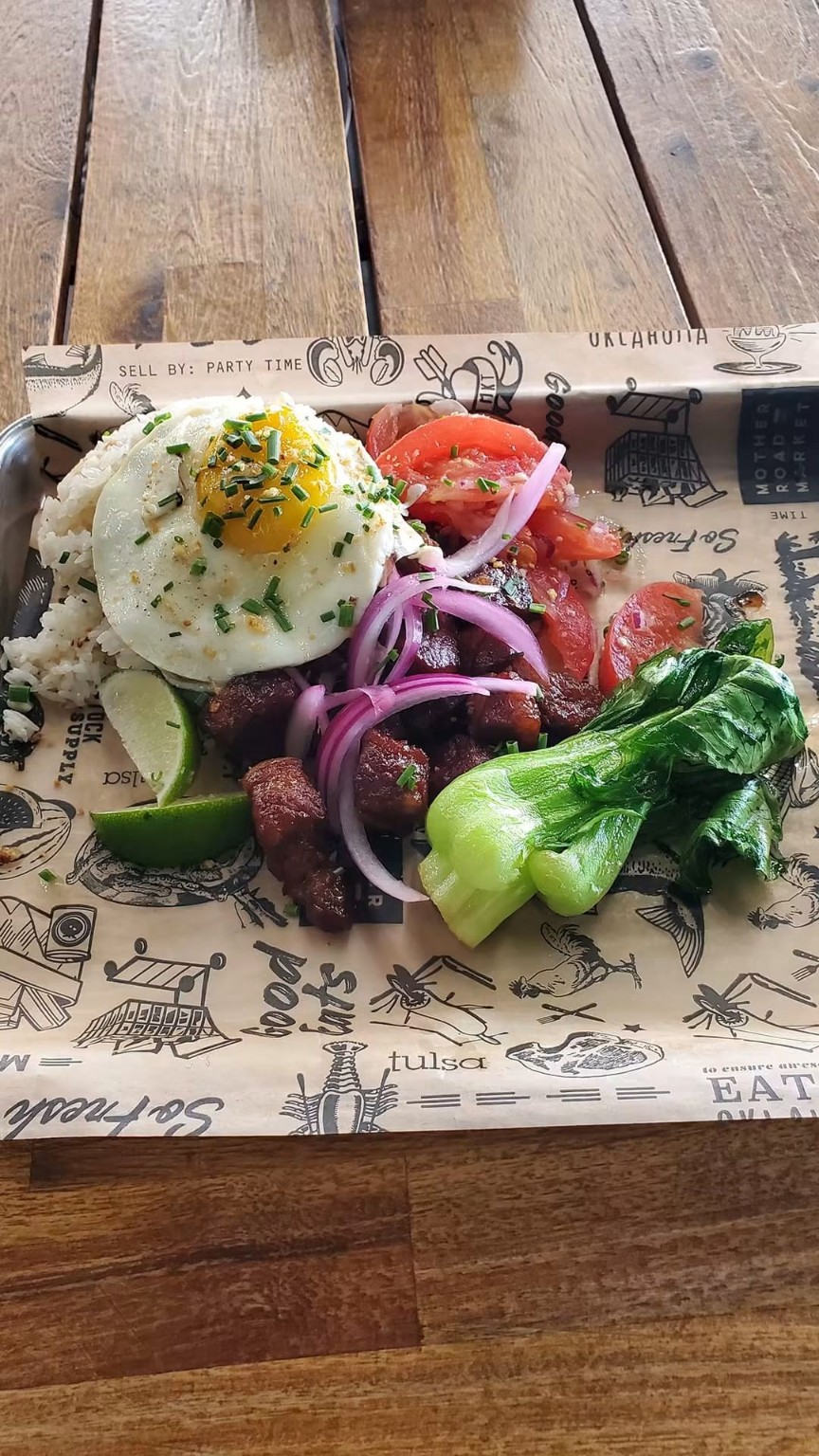 Composed plated dish with colorful vegetables